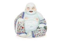 A FAMILLE ROSE PORCELAIN MODEL OF BUDAI