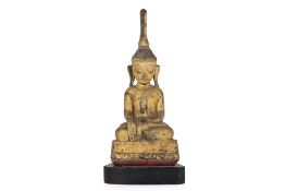 A BURMESE GILT AND LACQUERED BUDDHA STATUE