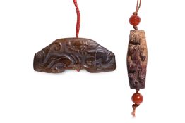 TWO GREEN AND RUSSET JADE CARVINGS