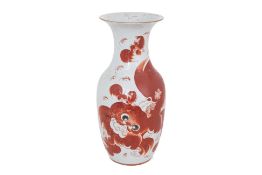 A FOO LION DECORATED PORCELAIN BALUSTER VASE