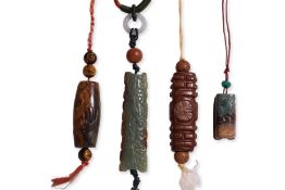 A GROUP OF FOUR JADE CARVINGS (1)