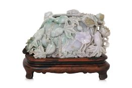 A LARGE LOTUS AND KOI FISH JADEITE CARVING