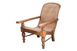 A DUTCH COLONIAL PLANTATION CHAIR