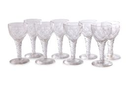 A SET OF EIGHT GEORGIAN FACET CUT WINE GLASSES