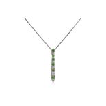 A TSAVORITE GARNET AND DIAMOND PENDANT ON CHAIN