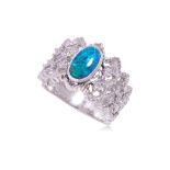 A BLACK OPAL AND DIAMOND RING