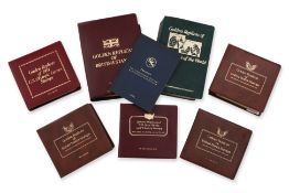 POSTAL COMMEMORATIVE SOCIETY, GOLDEN REPLICAS OF STAMPS, 7 ALBUMS