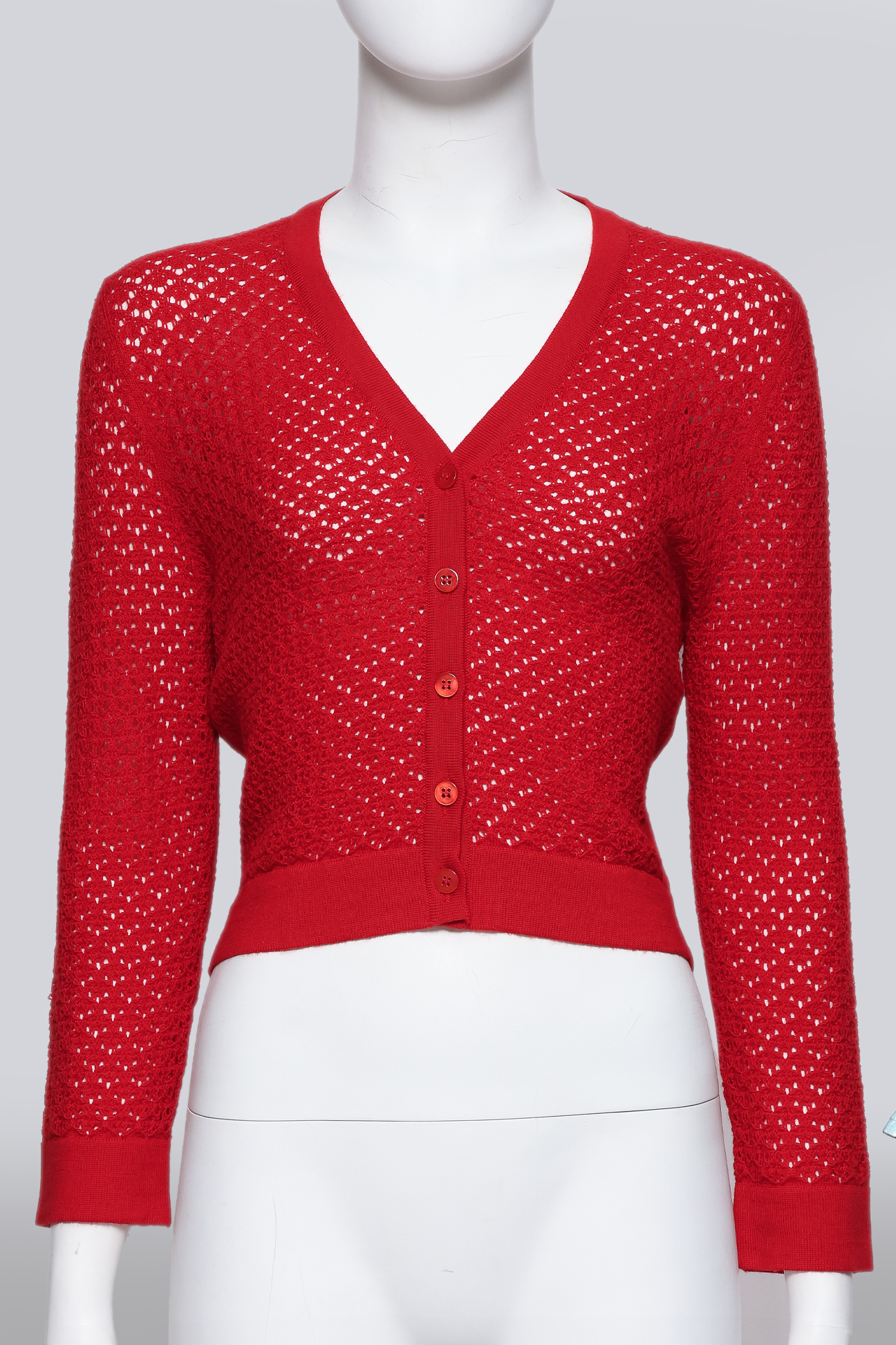 CAROLINA HERRERA - A RED KNIT CARDIGAN