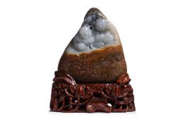 A CARVED JADE BOULDER