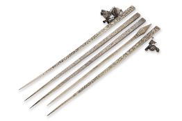 A GROUP OF FIVE VIETNAMESE HAIR PINS