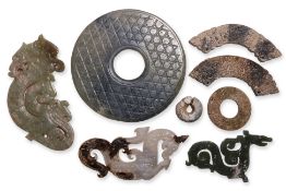 A GROUP OF 8 ARCHAISTIC JADE CARVINGS