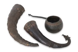 TWO SOUTHEAST ASIAN BRONZE 'RHYTON' DRINKING VESSELS AND A LADLE