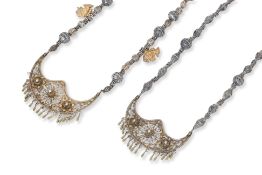 TWO SOUTHEAST ASIAN SILVER NECKLACES