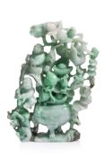 A CARVED JADEITE GROUP