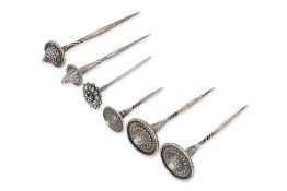 A GROUP OF SIX SILVER HAIRPINS