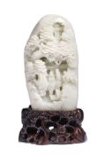 A WHITE JADE 'MOUNTAIN AND PINE' CARVING