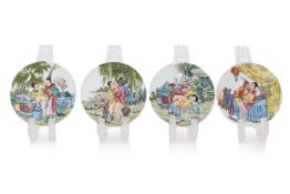 A SET OF FOUR FAMILLE ROSE EROTIC ART PORCELAIN SAUCERS