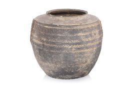 A DARK BROWN EARTHENWARE JAR