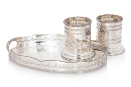A SILVER PLATED OVAL TRAY WITH A PAIR OF COASTERS