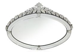 A LARGE VENETIAN OVAL MIRROR