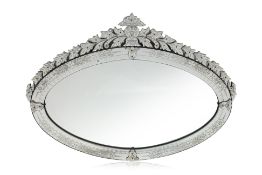 A LARGE VENETIAN OVAL MIRROR