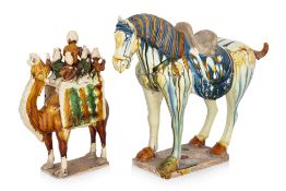 TWO TANG STYLE EARTHENWARE SANCAI-GLAZED POTTERY FIGURES