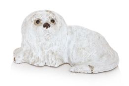A GLAZED POTTERY PEKINGESE DOG