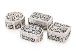 A GROUP OF FOUR CHINESE EXPORT SILVER PIERCED BOXES