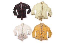 A GROUP OF SEVEN BAJU PANJANG AND KEBAYA