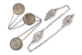 TWO SILVER KEROSANG BROOCHES