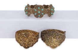 A GROUP OF THREE SILVER-GILT BRACELETS