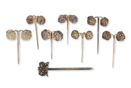 A GROUP OF EIGHT SILVER HAIR PINS