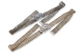TWO SILVER BELTS AND BUCKLES