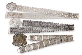 A GROUP OF THREE BELTS AND BUCKLES
