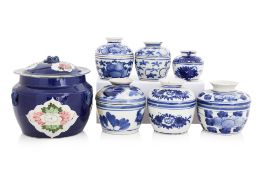 A GROUP OF SEVEN FENGXI BLUE AND WHITE BOWLS AND COVERS