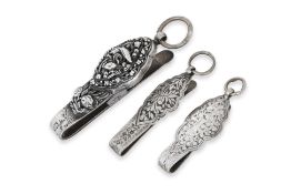 A GROUP OF THREE SILVER KEY HOLDERS