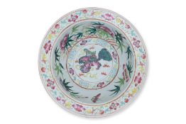 A FAMILLE ROSE BUDDHIST LION AND FLOWER DECORATED BASIN