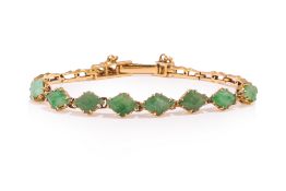 A FACETED JADE BRACELET