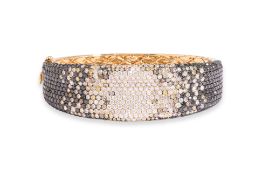 A MULTI COLOURED DIAMOND PAVE BANGLE