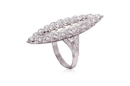 A DIAMOND PLATINUM 'NAVETTE' RING