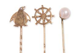 A GROUP OF THREE STICK PINS