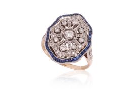 A DIAMOND AND SAPPHIRE RING