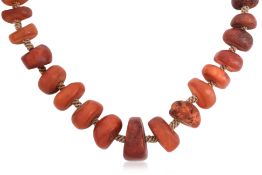 A POLISHED AMBER NECKLACE