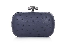 BOTTEGA VENETA – A LIMITED EDITION DARK PURPLE OSTRICH KNOT CLUTCH