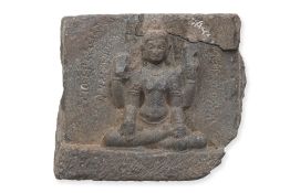 A SOUTH ASIAN CARVED STONE FRIEZE WITH INSCRIPTION