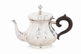 A LARGE ITALIAN SILVER TEAPOT