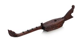 A LARGE ORNAMENTAL DAYAK 'SAPEH' BOAT LUTE