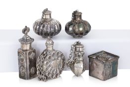 A GROUP OF INDIAN SILVER SCENT BOTTLES AND AN INKWELL