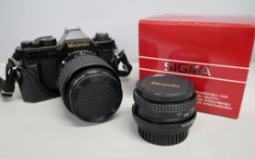 A Miranda 35mm film camera with Sigma 70mm lens and a Miranda 50mm lens