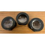 Three large Dallmeyer lenses, numbered 598755, 609910, 611521, lens diameter approximately 11cm